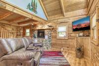 Living room with flat screen tv at Afternoon Delight - 1 bedroom cabin near Pigeon Forge